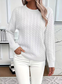 Pull doux à col rond blanc, maille torsadée, manches longues, finition côtelée