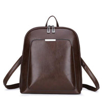 Sac à dos classique marron foncé en cuir, fermeture à deux anneaux et bretelles