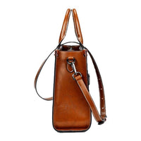 Sac cabas en cuir cognac avec fermeture à lanière et bandoulière