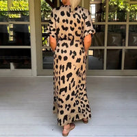 Robe longue imprimé léopard crème, dos visible, décolleté fermé, manches courtes, ceinture
