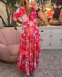 Robe longue rouge à col en V, manches bouffantes, imprimé floral, look décontracté.