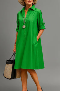 Robe midi chemise verte unie, col, patte de boutons, manches 3/4, coupe ample.