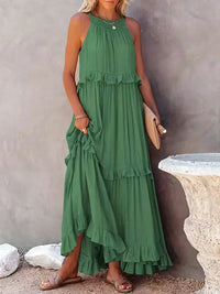 Robe longue sans manches verte à volants étagés et encolure froncée, poches latérales