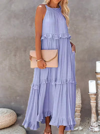Robe sans manches bleu clair à volants échelonnés, encolure haute, coupe ample