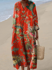 Robe longue ample rouge orange à motifs botaniques et floraux, col V, manches bouffantes