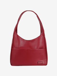 Sac porté épaule rouge en simili cuir, anse courte et ouverture supérieure arrondie.