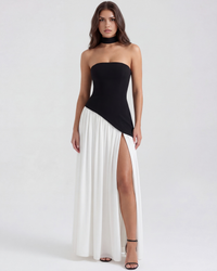 Robe Serena avec corset bandeau noir ajusté et jupe longue blanche plissée fendue