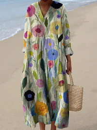Robe ample mi-longue en lin léger, motif fleurs multicolores sur fond clair