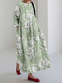 Robe longue imprimée vert à fleurs blanches, encolure ronde, manches trois-quarts