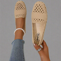 Mocassins Ida™ ajourés en maille tressée abricot, semelle intérieure avec logo.