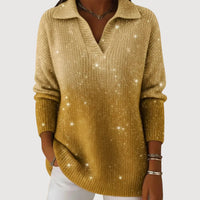 Pull scintillant en maille doré, encolure V, manches longues, poignets côtelés.