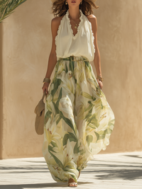 Ensemble léger sans manches blanc et jupe fluide à motif floral vert