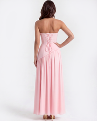 Robe longue rose dos nu avec laçage et jupe longue plissée