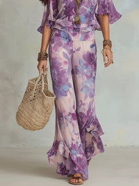 Ensemble floral violet : pantalon ample et haut volanté à motifs, coupe fluide