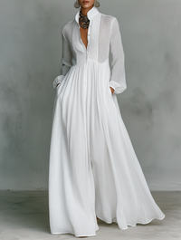 Robe longue blanche en lin, encolure chemise boutonnée, taille marquée, manches longues
