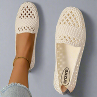 Mocassins Ida™ ajourés en crochet blanc cassé, semelle intérieure avec logo.