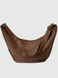 Sac bandoulière en cuir brun foncé, forme hobo, anse réglable à boucle