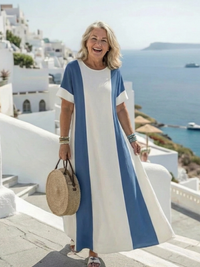 Robe longue bleu et blanc à manches courtes, encolure ronde, coupe ample contrastée