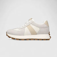 Chaussure élégante blanche à empiècements beige et semelle crantée marron
