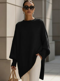 Pull en maille noir, encolure ronde, manches chauve-souris, ourlet asymétrique