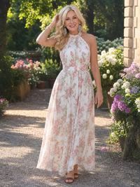 Robe midi fluide imprimée floral, encolure haute et coupe ample.