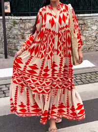 Robe-chemise rouge et écru à motifs géométriques, col chemise, ourlet volanté.