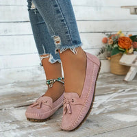 Mocassins orthopédiques en daim rose, bout rond, lacets noués, semelle crantée.