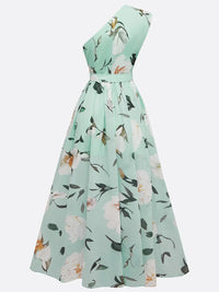 Robe longue trapèze vert clair à fleurs, décolleté une épaule, ceinture avec boucle