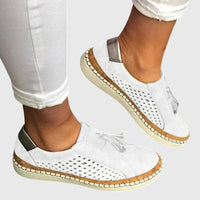 Chaussures orthopédiques sans Piper blanches, tige perforée et semelle beige cousue