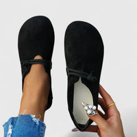Mocassins orthopédiques noirs, vue arrière avec bride élastique et bout arrondi.