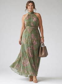 Robe midi vert sauge à encolure haute froncée, motifs floraux roses, jupe évasée.