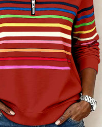 Sweat rouge à demi-zip, rayures horizontales colorées sur le buste