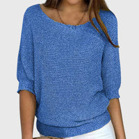 Pull ample en maille douce bleu, col rond, manches trois-quarts bouffantes, bords côtelés