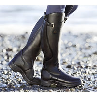 Bottes montantes à hauteur genou cuir sombre, patte à boucle et semelle crantée