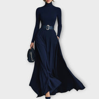 Robe longue à col montant, manches longues, ceinture à boucle, jupe ample plissée