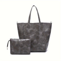 Grand sac cabas rétro gris foncé avec anses et pochette zippée assortie.