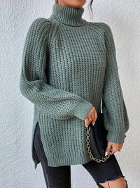 Pull col roulé vert en maille texturée, manches longues, coupe ample, base avec fente