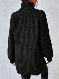 Pull col roulé noir en maille texturée, vue de dos, coupe ample, ourlet droit