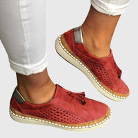 Chaussures orthopédiques sans Piper rouges, tige perforée et semelle beige à couture