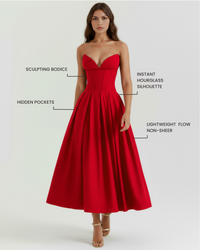 Robe rouge bustier sculptant, empiècements corset, jupe ample mi-longue.