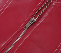 Veste en cuir rouge : détail fermeture éclair à tirette métal et surpiqûres
