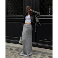 Veste en cuir noire rétro, fermeture boutonnée, franges aux bas de manches
