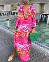 Robe longue Bea col en V, rose à motifs zébrés jaune, manches longues.