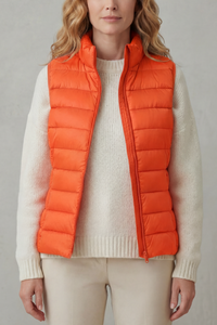 Doudoune sans manches orange vif, col montant, matelassage continu, zip central