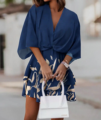 Robe courte bleu nuit à imprimé feuillage blanc, nœud à la taille