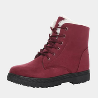 Bottes antidérapantes femme rouges à lacets, col en fausse fourrure blanche, semelle crantée