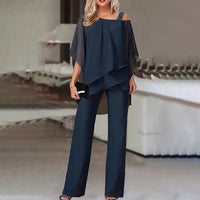 Ensemble deux pièces bleu marine : haut drapé épaules dénudées et pantalon large évasé