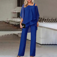 Ensemble deux pièces bleu : haut drapé épaules dénudées et pantalon large évasé