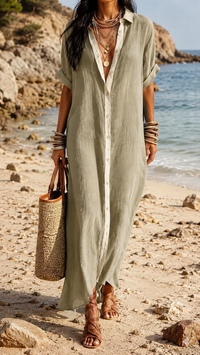 Robe longue boutonnée kaki, encolure V, manches courtes, coupe fluide, fente latérale.