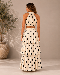 Ensemble à pois noir et blanc, jupe longue à volants superposés, dos découvert